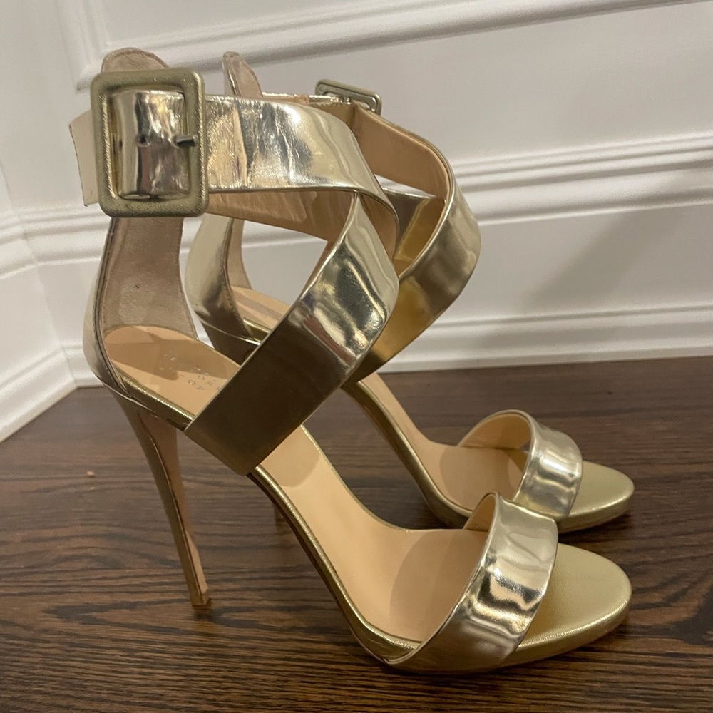 Barney’s co-op gold ankle strap heels